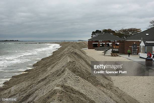 Protective berms are viewed on Compo Beach as the first signs of Hurricane Sandy approach on October 28, 2012 in Westport, Connecticut. The storm,...