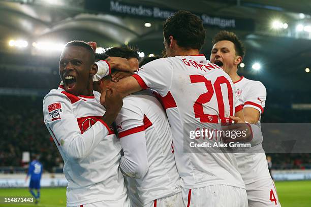 Vedad Ibisevic 8hidden) of Stuttgart celebrates his team's second goal with team mates during the Bundesliga match between VfB Stuttgart and...