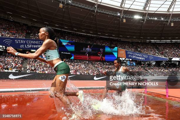 Kenya's Beatrice Chepkoech and Kenya's Jackline Chepkoech compete in the women's 3000m steeplechase event during the IAAF Diamond League athletics...