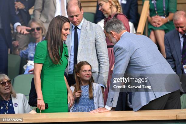 Catherine, Princess of Wales, Princess Charlotte of Wales, Prince William, Prince of Wales speak with King Felipe VI of Spain during Carlos Alcaraz...