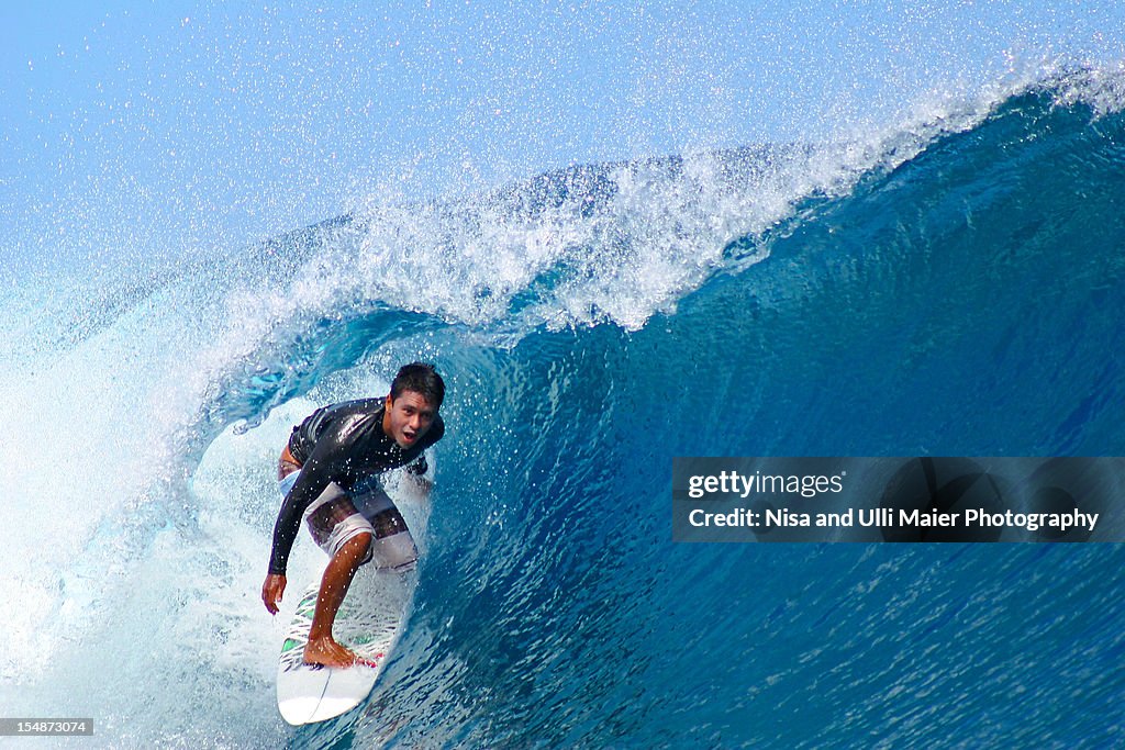 Surfing boy