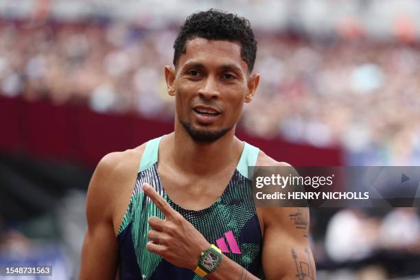 South Africa's Wayde van Niekerk celebrates after winning the men's 400m event during the IAAF Diamond League athletics meeting at the London Stadium...