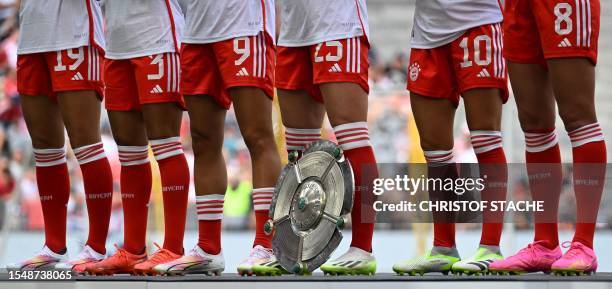 The Bundesliga trophy stands in front of players during the team presentation of the German first division Bundesliga club Bayern Munich in the...