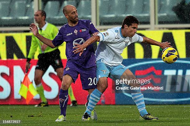 Borja Valero of ACF Fiorentina fights for the ball with Hernanes of SS Lazio during the Serie A match between ACF Fiorentina and S.S. Lazio at Stadio...