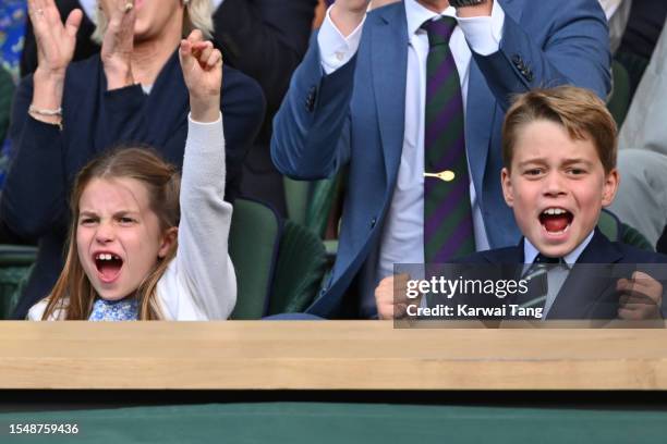 Princess Charlotte of Wales and Prince George of Wales celebrate during Carlos Alcaraz vs Novak Djokovic in the Wimbledon 2023 men's final on Centre...