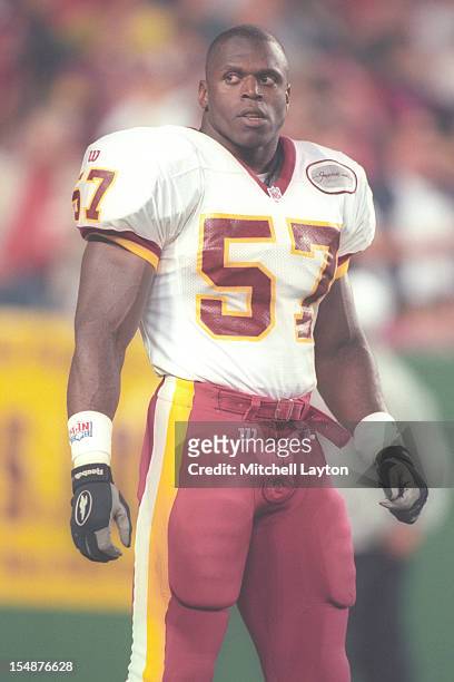 Ken Harvey of the Washington Redskins runs with the ball during a football game against the Dallas Cowboys the at Jack Kent Cooke Stadium on...