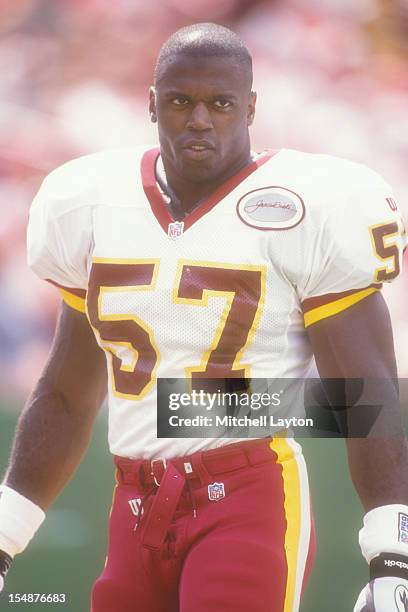 Ken Harvey of the Washington Redskins looks on before a football game against the Arizona Cardinals on September 14, 1997 at Jack Kente Cooke Stadium...