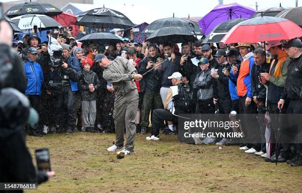 Northern Ireland's Rory McIlroy plays his second shot on the 18th on day four of the 151st British Open Golf Championship at Royal Liverpool Golf...
