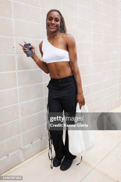 Queen Egbo of the Washington Mystics arrives to the arena before the game against the Phoenix Mercury on July 23, 2023 at Entertainment and Sports...