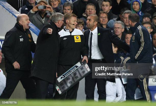 Managers Sir Alex Ferguson of Manchester United and Roberto di Matteo of Chelsea argue on the touchline during the Barclays Premier League match...