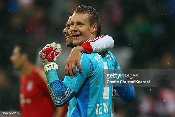 Manuel Friedrich and Bernd Leno of Leverkus celebrate the 2-1 victory after the Bundesliga match between FC Bayern Muenchen and Bayer 04 Leverkusen...