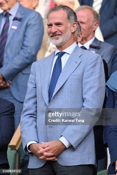 King Felipe VI of Spain watches Carlos Alcaraz win the Wimbledon 2023 men's final on Centre Court during day fourteen of the Wimbledon Tennis...