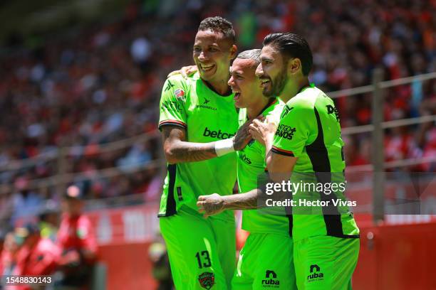 Agustin Urzi of FC Juarez celebrates with teammates after scoring the team's first goal during the 3rd round match between Toluca and FC Juarez as...