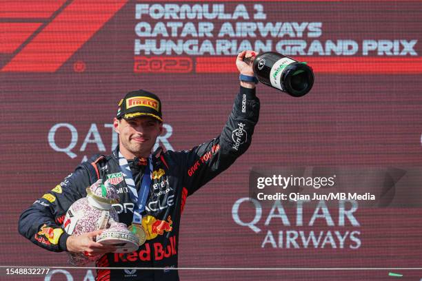 Max Verstappen of the Netherlands and Oracle Red Bull Racing celebrates on the podium during the F1 Grand Prix of Hungary at Hungaroring on July 23,...