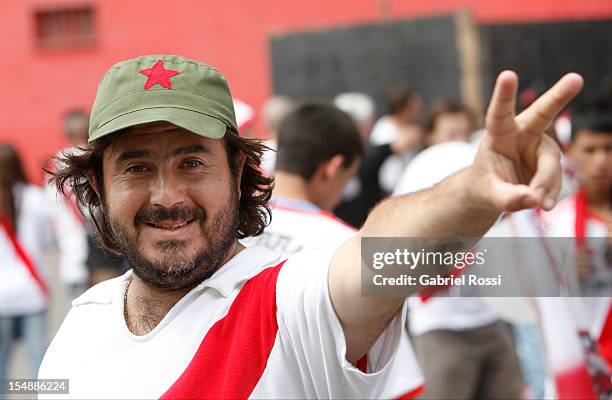 Fan of River Plate supports his team before a match between River Plate and Boca Juniors as part of the Torneo Inicial at the Estadio Vespusio...