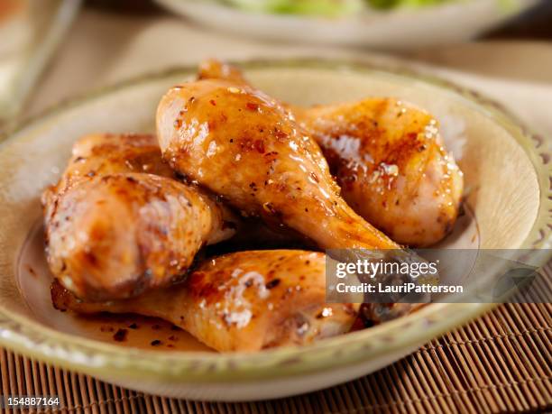 glazed chicken drumsticks - ugnsstekt kyckling bildbanksfoton och bilder