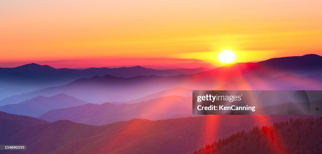 Sunset on a foggy mountain range