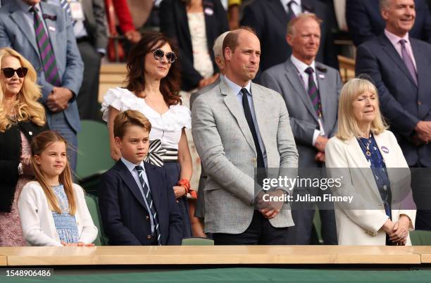 Princess Charlotte of Wales, Prince George of Wales and Prince William, Prince of Wales, are seen in the Royal Box during the Men's Singles Final...