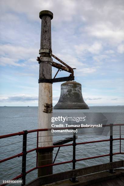 sounds of the sea: the old bell of southend pier - southend pier stock pictures, royalty-free photos & images