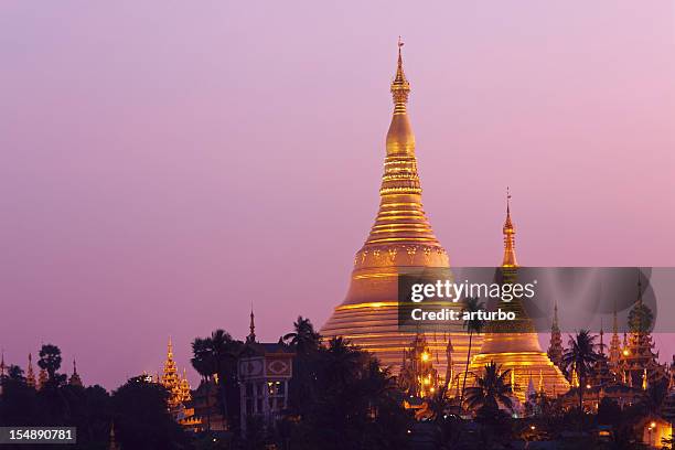 schwedagon pagoda at sunrise - shwedagon pagoda stock pictures, royalty-free photos & images