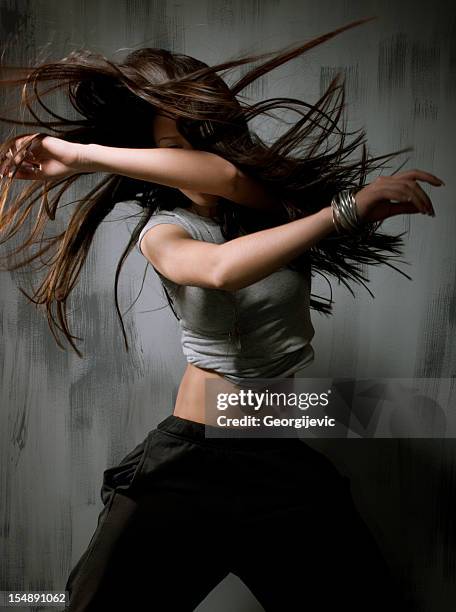 female dancer - funky hair studio shot stock pictures, royalty-free photos & images