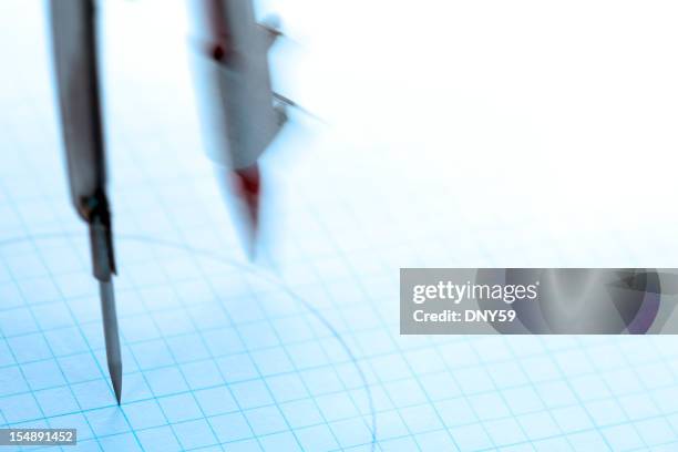 Compass Graph Side View Drawing Compass On Graph Paper Photos and Premium High Res Pictures ...