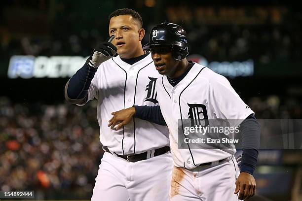 Miguel Cabrera of the Detroit Tigers celebrates with teammate Austin Jackson after hitting a two run home run against Matt Cain of the San Francisco...