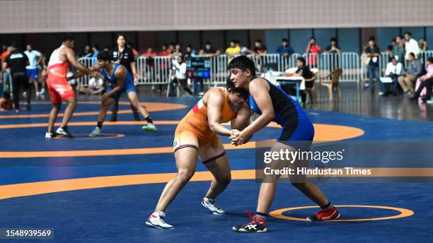 Wrestlers during the Asian Games 2023 wrestling trials at IGI stadium, on July 22, 2023 in New Delhi, India.