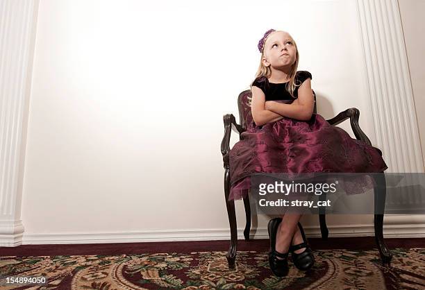 defiant young girl in party dress - rich fury stock pictures, royalty-free photos & images
