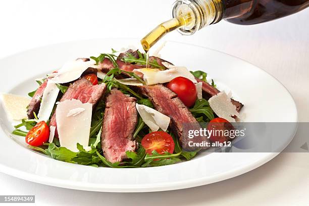 tagliata di - rucola foto e immagini stock
