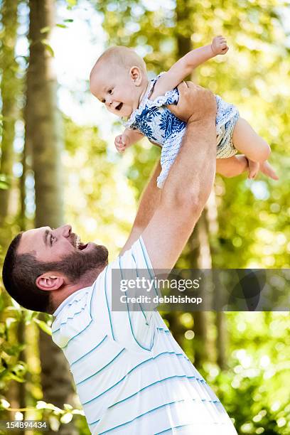 pai balançar bebé menina - baby beard imagens e fotografias de stock