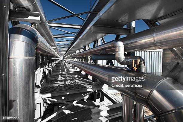 outdoor metallic gray pipes of an air conditioning system - pipes and ventilation stock pictures, royalty-free photos & images