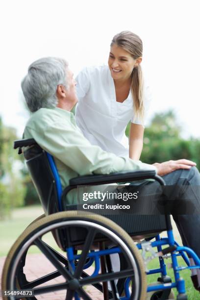 how you are feeling now? - patient surrounded by family stock pictures, royalty-free photos & images