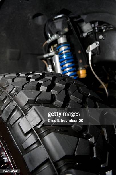 tire and shocks - suspension bridge stock pictures, royalty-free photos & images