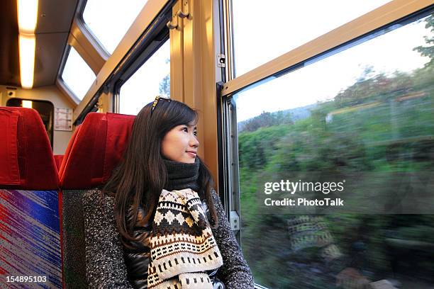 beautiful woman enjoy trip - bus window stock pictures, royalty-free photos & images