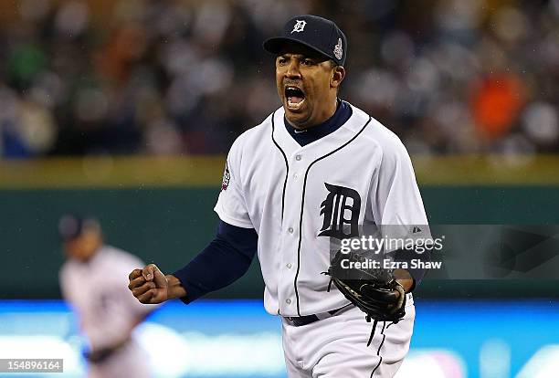 Octavio Dotel of the Detroit Tigers reatcs after striking out Buster Posey of the San Francisco Giants in the eighth inning during Game Four of the...