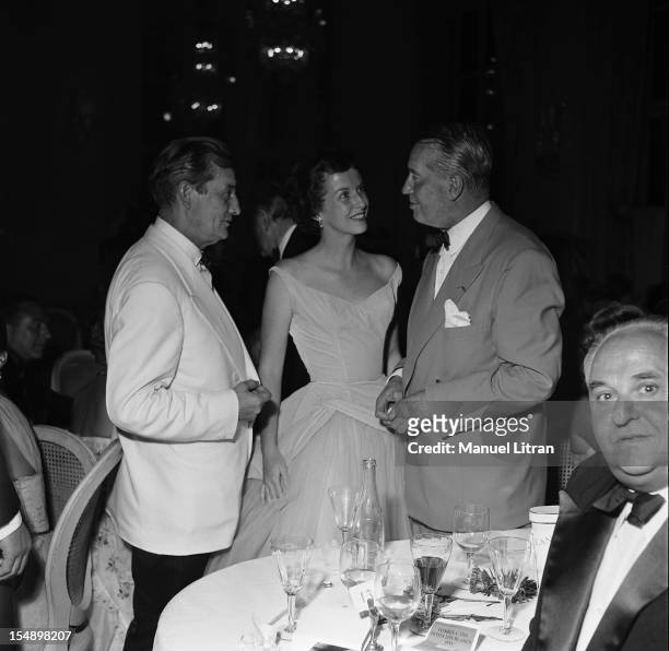 Marcel Pagnol, Betsy Blair and Maurice Chevalier at Gala little white beds at the Deauville casino.