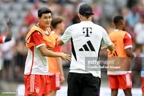 Minjae Kim of Bayern Muenchen and head coach Thomas Tuchel of Bayern Muenchen gestures during the team presentation of FC Bayern München at Allianz...