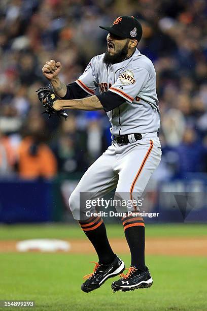 Sergio Romo of the San Francisco Giants celebrates striking out Miguel Cabrera of the Detroit Tigers in the tenth inning to win Game Four of the...