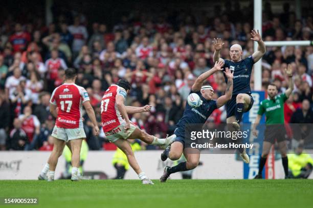 Brad Schneider of Hull KR kicks a drop goal in extra time to win the match on golden point during the Betfred Challenge Cup Semi Final match between...