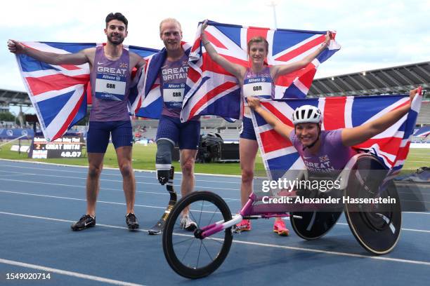 Zachary Shaw, Jonnie Peacock, Sophie Hahn and Samantha Kinghorn of Great Britain celebrate after finishing second in the Universal 4x100m Relay Final...