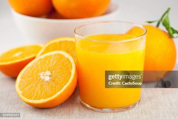 orange orangensaft - orange juice stock-fotos und bilder