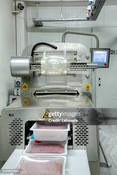 food packing and vacuum - frozen food manufacturing stock pictures, royalty-free photos & images
