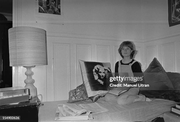 May 20 the actress Isabelle Huppert in his apartment during the film 'The Lacemaker' by Claude Goretta, Isabelle Huppert, sitting on her bed.