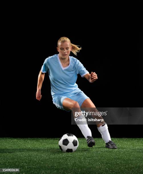 soccer player - football striker stock pictures, royalty-free photos & images