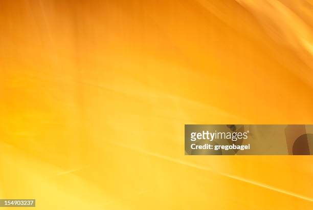 luz dramática de cor amarelo- laranja, textura ou fundo - amarelo imagens e fotografias de stock
