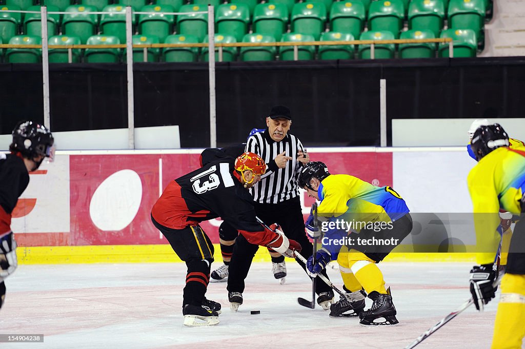Face off during ice hockey game