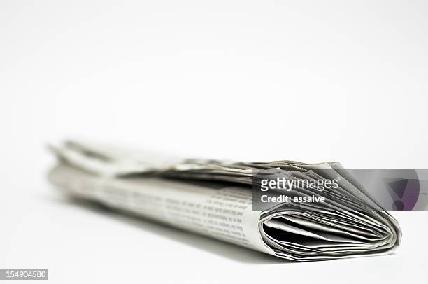 newspaper - rolled newspaper stock pictures, royalty-free photos & images