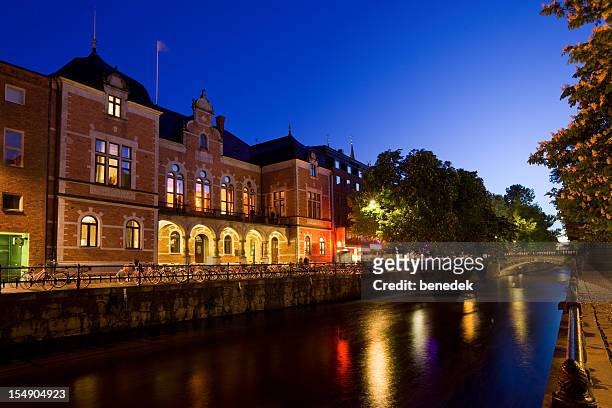 uppsala sweden fyris river cityscape with nightclub - uppsala stock pictures, royalty-free photos & images