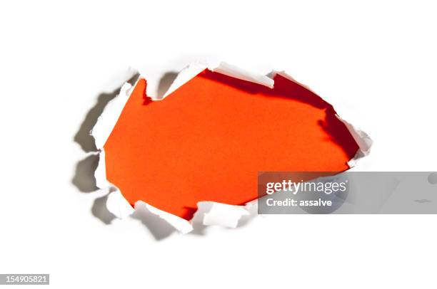 loch im papier zerrissen - loch stock-fotos und bilder
